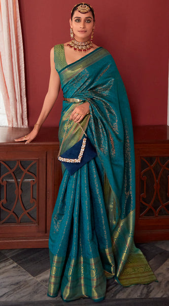 Ravishing Rama Kanjivaram Silk Saree With Flameboyant Blouse Piece