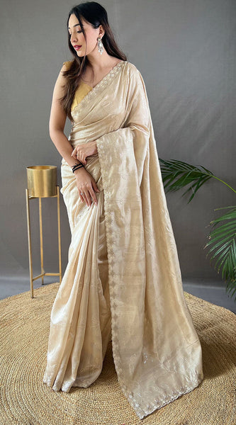 Pretty Beige Embroidery Work Soft Silk Saree With Phenomenal Blouse Piece