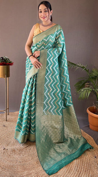 Outstanding Green Cotton Silk Saree With Capricious Blouse Piece