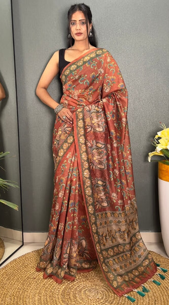Desirable Orange Kalamkari Printed Saree With Stunner Blouse Piece