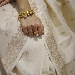 Elegant Banarasi Silk Saree with Gold Zari Embellishments Cream