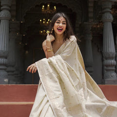 Elegant Banarasi Silk Saree with Gold Zari Embellishments Cream