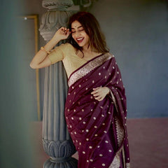 Elegant Banarasi Silk Saree with Gold Zari Embellishments Wine