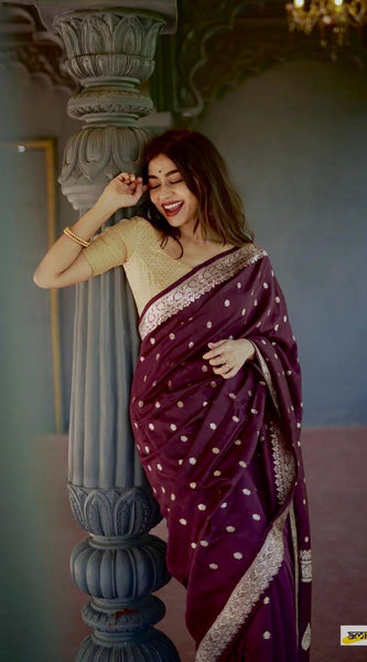 Elegant Banarasi Silk Saree with Gold Zari Embellishments Wine