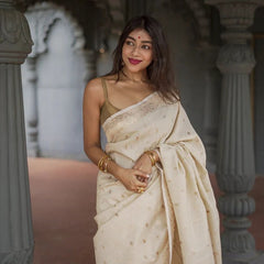 Elegant Banarasi Silk Saree with Gold Zari Embellishments Cream