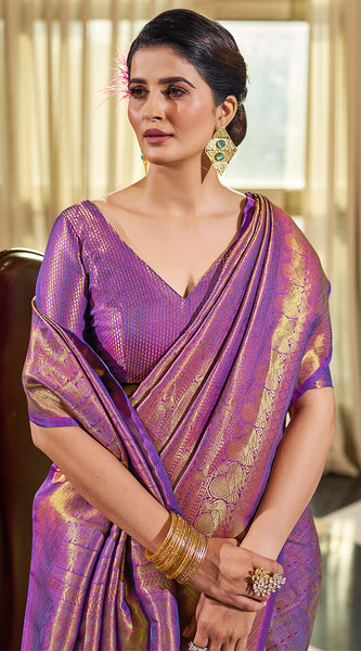 Enticing Purple Kanjivaram Silk Saree With Beleaguer Blouse Piece