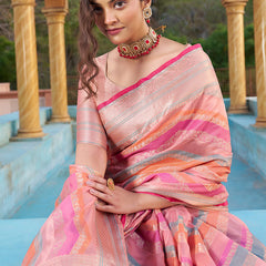 Mesmerising Pink Organza Silk Saree With Delightful Blouse Piece
