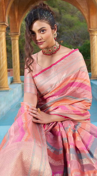 Mesmerising Pink Organza Silk Saree With Delightful Blouse Piece