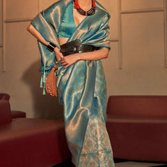 Flattering Turquoise Kanjivaram Silk Saree With Pretty Blouse Piece