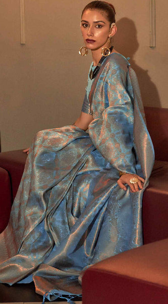 Gratifying Firozi Kanjivaram Silk Saree With Girlish Blouse Piece
