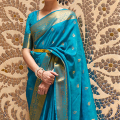 Exuberant Firozi Kanjivaram Silk Saree With Artistic Blouse Piece