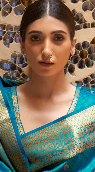 Exuberant Firozi Kanjivaram Silk Saree With Artistic Blouse Piece