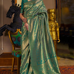 Innovative Rama Kanjivaram Silk Saree With Adorning Blouse Piece