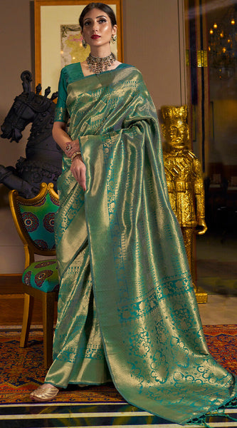 Innovative Rama Kanjivaram Silk Saree With Adorning Blouse Piece