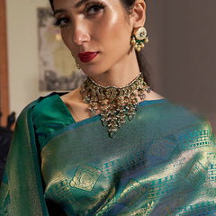 Innovative Rama Kanjivaram Silk Saree With Adorning Blouse Piece