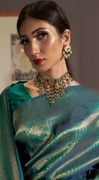 Innovative Rama Kanjivaram Silk Saree With Adorning Blouse Piece