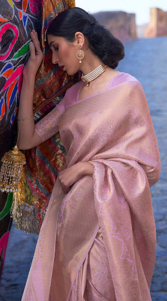 Prominent Baby Pink Kanjivaram Silk Saree with Entrancing Blouse Piece