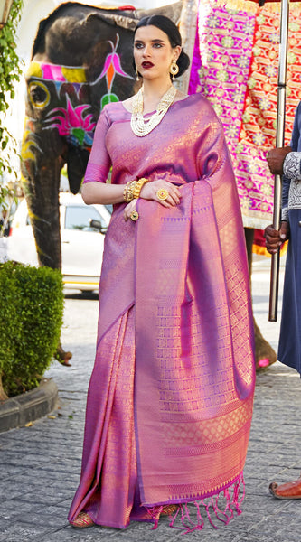 Tempting Purple Kanjivaram Silk Saree With Snappy Blouse Piece