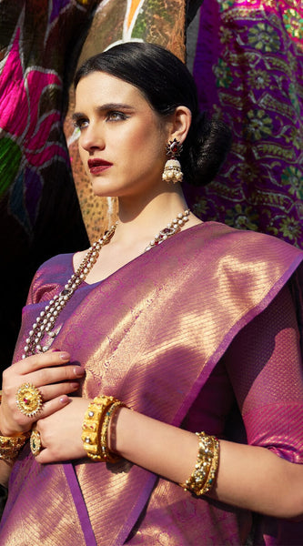 Tempting Purple Kanjivaram Silk Saree With Snappy Blouse Piece