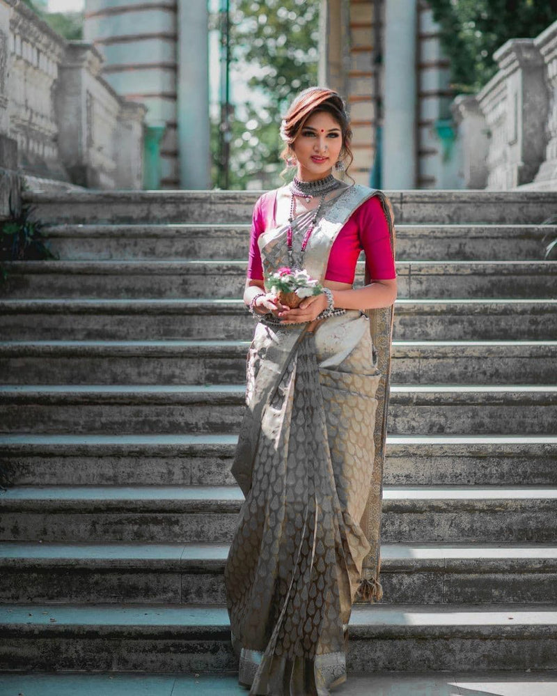 Beautifully Crafted Lichi Silk Saree with Zari Border