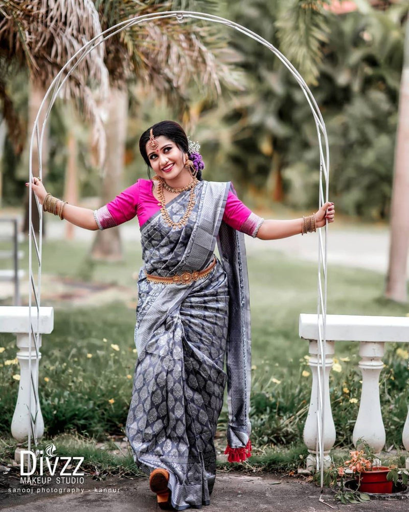 Beautifully Crafted Lichi Silk Saree with Zari Border