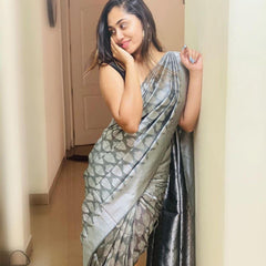 Beautifully Crafted Lichi Silk Saree with Zari Border
