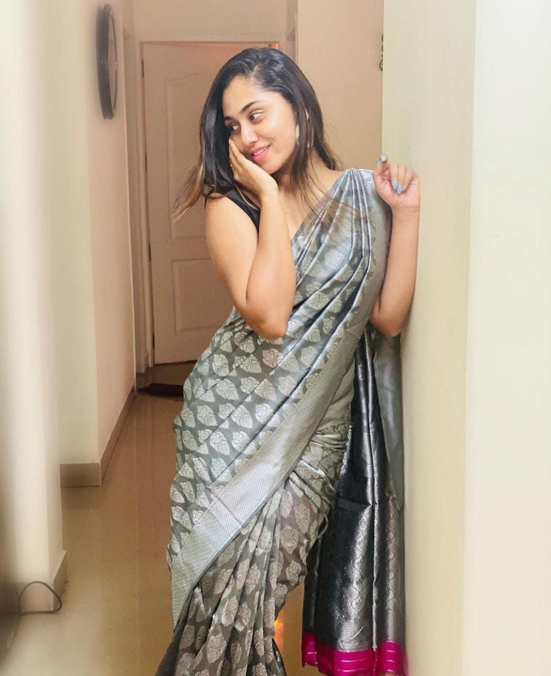 Beautifully Crafted Lichi Silk Saree with Zari Border