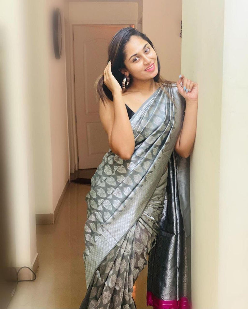 Beautifully Crafted Lichi Silk Saree with Zari Border