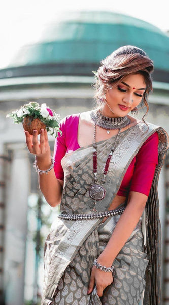 Beautifully Crafted Lichi Silk Saree with Zari Border