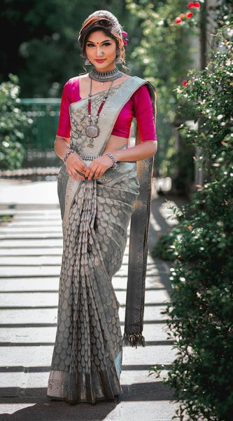Beautifully Crafted Lichi Silk Saree with Zari Border