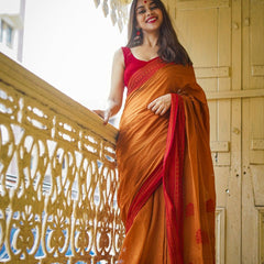 Stunning Yellow Cotton Silk Saree With Glowing Blouse Piece