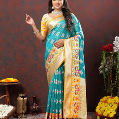 Engaging Firozi Organza Silk Saree With Tempting Blouse Piece