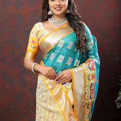 Engaging Firozi Organza Silk Saree With Tempting Blouse Piece