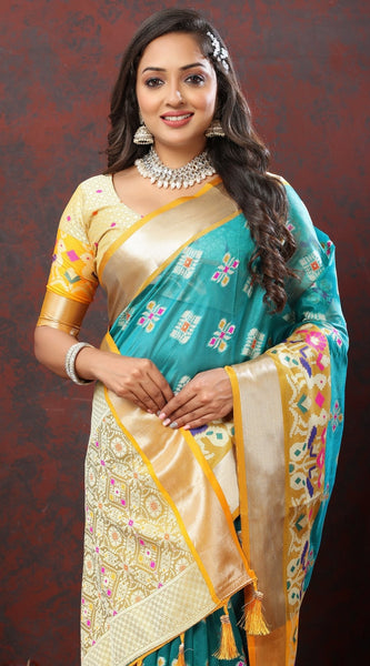 Engaging Firozi Organza Silk Saree With Tempting Blouse Piece