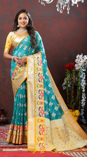 Engaging Firozi Organza Silk Saree With Tempting Blouse Piece