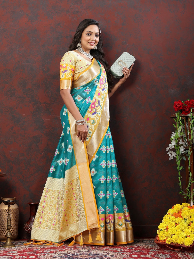 Engaging Firozi Organza Silk Saree With Tempting Blouse Piece