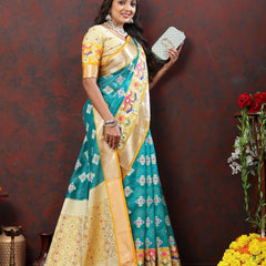 Engaging Firozi Organza Silk Saree With Tempting Blouse Piece