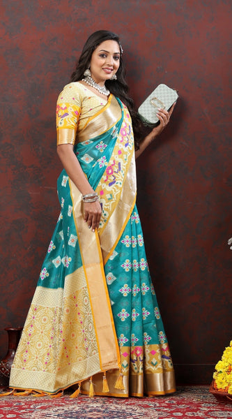 Engaging Firozi Organza Silk Saree With Tempting Blouse Piece