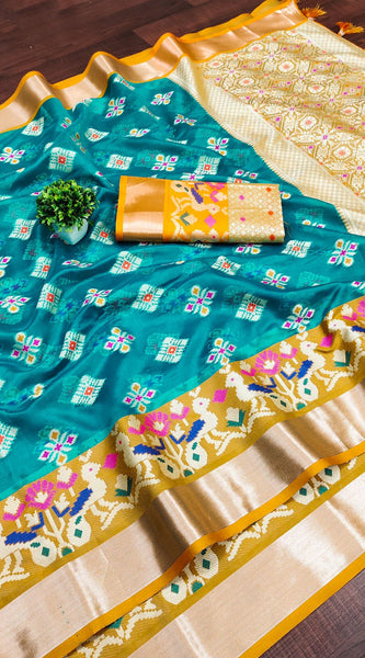 Engaging Firozi Organza Silk Saree With Tempting Blouse Piece