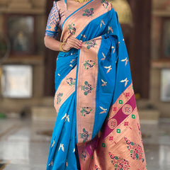 Elaborate Firozi Paithani Silk Saree With Whimsical Blouse Piece