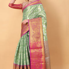Unequalled Pista Kanjivaram Silk Saree With Scintillating Blouse Piece