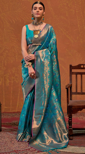 Precious Firozi Kanjivaram Silk Saree With Gleaming Blouse Piece