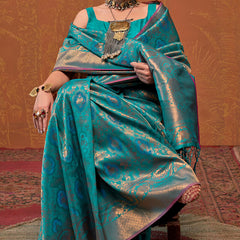 Precious Firozi Kanjivaram Silk Saree With Gleaming Blouse Piece