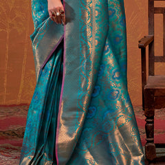 Precious Firozi Kanjivaram Silk Saree With Gleaming Blouse Piece
