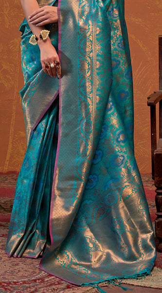 Precious Firozi Kanjivaram Silk Saree With Gleaming Blouse Piece