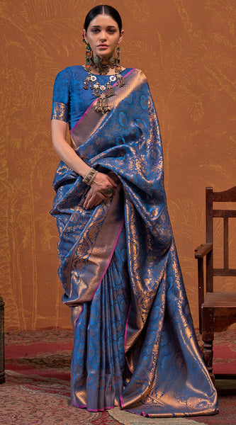 Dazzling Navy Blue Kanjivaram Silk Saree With Deserving Blouse Piece