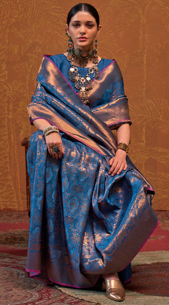 Dazzling Navy Blue Kanjivaram Silk Saree With Deserving Blouse Piece