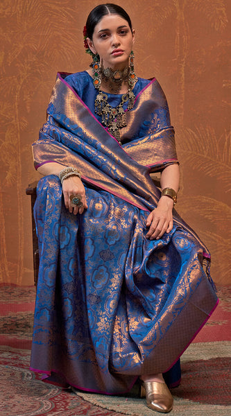 Dazzling Navy Blue Kanjivaram Silk Saree With Deserving Blouse Piece