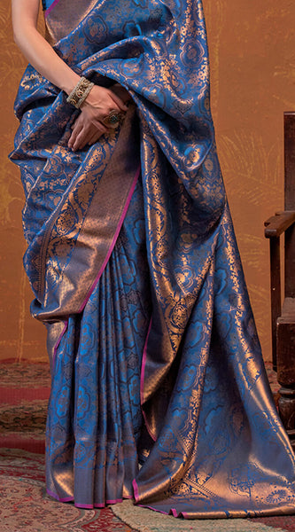 Dazzling Navy Blue Kanjivaram Silk Saree With Deserving Blouse Piece