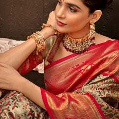 Inimitable Beige and Red Kanjivaram Silk Saree With Luminous Blouse Piece